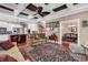 An open floor plan has lots of light and provides convenient access to the dining room and kitchen at 128 Knotty Pine Way, Murrells Inlet, SC 29576