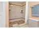 The walk-in shower has tile and a shower curtain at 128 Knotty Pine Way, Murrells Inlet, SC 29576