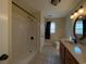 Bathroom featuring a walk-in shower, a toilet, and updated fixtures at 140 Blue Pride Dr., Loris, SC 29569