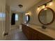 Bathroom featuring dual sinks, a walk-in shower, and modern fixtures at 140 Blue Pride Dr., Loris, SC 29569