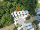 Aerial shot showing the home's location in a cul-de-sac, surrounded by lush greenery and well-maintained landscaping at 147 Weatherboard Ct., Pawleys Island, SC 29585