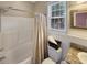 Clean bathroom featuring a tub, shower, granite countertop and decorative mirror at 147 Weatherboard Ct., Pawleys Island, SC 29585
