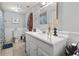 Bathroom featuring white vanity and sink, and shower curtain at 1710-C Edge Dr., North Myrtle Beach, SC 29582