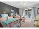 Bright bedroom with two beds, sliding glass door to outdoor deck at 1710-C Edge Dr., North Myrtle Beach, SC 29582