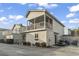 Two-story house featuring screened-in porch, balcony, and a golf cart at 1710-C Edge Dr., North Myrtle Beach, SC 29582