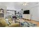 Bright and airy living room with hardwood floors open to dining area and modern decor at 1710-C Edge Dr., North Myrtle Beach, SC 29582