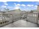 Upper porch view showcasing neighborhood homes and spacious outdoor space at 1710-C Edge Dr., North Myrtle Beach, SC 29582