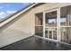 Second story porch with a screened door, offering a relaxing view and an open air at 1710-C Edge Dr., North Myrtle Beach, SC 29582