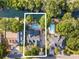 Aerial view showcasing a home with a backyard pool and direct waterway access at 174 Edward Ave., Murrells Inlet, SC 29576