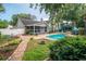 Expansive backyard features a pool, fire pit, gazebo, and screened in back porch at 174 Edward Ave., Murrells Inlet, SC 29576