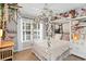 Charming bedroom adorned with floral accents, plush toys and decorative shelving at 174 Edward Ave., Murrells Inlet, SC 29576