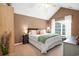 Vaulted ceiling bedroom featuring a queen bed, cozy linens, and a light-filled window at 174 Edward Ave., Murrells Inlet, SC 29576