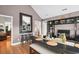 Stylish dining room with vaulted ceiling and an elegant dining table with seating at 174 Edward Ave., Murrells Inlet, SC 29576