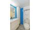Bright bathroom with blue tiled accent wall, sink, and toilet for essential convenience at 201 74Th Ave. N # 2333, Myrtle Beach, SC 29572
