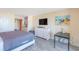 Cozy bedroom with dining space, updated dresser, and TV for a convenient stay at 201 74Th Ave. N # 2333, Myrtle Beach, SC 29572