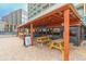 Outdoor patio seating with access to indoor dining and picnic tables at 201 74Th Ave. N # 2333, Myrtle Beach, SC 29572