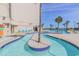 Relaxing lazy river area features crystal-clear water, lush palm trees and comfortable lounging options at 201 74Th Ave. N # 2333, Myrtle Beach, SC 29572