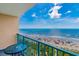 Stunning ocean view from private balcony with clear blue water, a sandy beach and beachgoers at 201 74Th Ave. N # 2740, Myrtle Beach, SC 29572