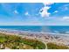 Expansive ocean and beach view with blue skies, soft sand and beachgoers enjoying the summer sun at 201 74Th Ave. N # 2740, Myrtle Beach, SC 29572
