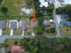 Overhead view of a cozy home near a serene pond, featuring a well-maintained yard and charming neighborhood at 2021 Loblolly St., Georgetown, SC 29440