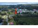 Scenic aerial view showcasing a home nestled among lush greenery, offering a peaceful retreat with distant water views at 2021 Loblolly St., Georgetown, SC 29440