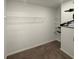 Spacious walk-in closet with wire shelving, providing ample storage solutions at 2021 Loblolly St., Georgetown, SC 29440