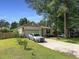 Well-kept single Gathering home with a two car garage and a driveway with room for more parking at 2021 Loblolly St., Georgetown, SC 29440