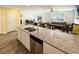 Island kitchen with granite countertops overlooking the dining and living areas perfect for entertaining at 2021 Loblolly St., Georgetown, SC 29440