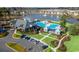 Aerial shot displays the community clubhouse, pool, and surrounding amenities at 204 Kinross Ct., Little River, SC 29566