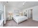 Bedroom featuring a white bed, two side tables, and bright natural lighting at 204 Kinross Ct., Little River, SC 29566
