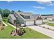 Beautiful single-Gathering home with a two-car garage, manicured lawn, and inviting curb appeal at 204 Kinross Ct., Little River, SC 29566