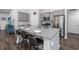Kitchen island with granite countertops, stainless steel appliances, and modern cabinetry at 204 Kinross Ct., Little River, SC 29566