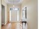 Spacious foyer with tile flooring, a coat rack, and a decorative mirror enhancing the entry at 2210 Haystack Way, Myrtle Beach, SC 29579