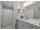 Bright bathroom with an updated vanity, tub, and modern fixtures at 2212 Leeboard Ct., Myrtle Beach, SC 29579