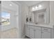 Bright bathroom with modern fixtures, an adjacent closet, and plenty of natural light at 2212 Leeboard Ct., Myrtle Beach, SC 29579