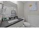 Bright bathroom with a large countertop, a sleek white sink, and modern fixtures at 2212 Leeboard Ct., Myrtle Beach, SC 29579