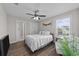 Cozy bedroom featuring a ceiling fan, a double bed, and natural light from the bright window at 2212 Leeboard Ct., Myrtle Beach, SC 29579