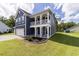 Charming two-story home with a well-manicured lawn and a two-car garage at 2212 Leeboard Ct., Myrtle Beach, SC 29579