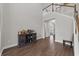 Grand foyer with staircase, hard wood floors, and a bar area at 2212 Leeboard Ct., Myrtle Beach, SC 29579