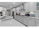 Kitchen with white cabinets, stainless appliances, and a quartz countertop at 2212 Leeboard Ct., Myrtle Beach, SC 29579