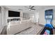 Second floor living area with a modern couch, TV and games for entertaining at 2212 Leeboard Ct., Myrtle Beach, SC 29579