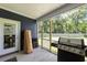 Cozy screened-in porch featuring access to a lovely backyard and dining area at 2212 Leeboard Ct., Myrtle Beach, SC 29579