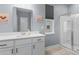 Bright bathroom with walk-in shower, white vanity and decor at 226 Calhoun Falls Dr., Myrtle Beach, SC 29579