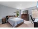 Carpeted bedroom featuring a bed, dresser, and window, perfect for rest and relaxation at 226 Calhoun Falls Dr., Myrtle Beach, SC 29579