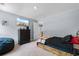 Well-lit bedroom with a bed, TV, and dresser, offering a cozy space for relaxation and entertainment at 226 Calhoun Falls Dr., Myrtle Beach, SC 29579