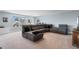 Spacious bonus room with a large sectional sofa and plenty of natural light at 226 Calhoun Falls Dr., Myrtle Beach, SC 29579