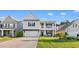 Inviting two-story home features a covered front porch and attached garage, set in a well-maintained neighborhood at 226 Calhoun Falls Dr., Myrtle Beach, SC 29579