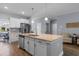 Bright kitchen features a large island, stainless steel appliances, and ample counter space, perfect for culinary creations at 226 Calhoun Falls Dr., Myrtle Beach, SC 29579