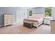 Bedroom with large windows, carpet, a chest, and a white bed frame at 226 Calhoun Falls Dr., Myrtle Beach, SC 29579