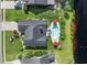 An aerial shot highlights the fenced pool and patio area, plus lush landscaping of the backyard at 2369 Clandon Dr., Myrtle Beach, SC 29579